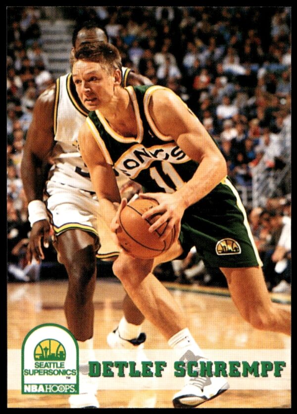Seattle SuperSonics Detlef Schrempf 1993-94 Hoops basketball card #411 showcases mid-action performance.