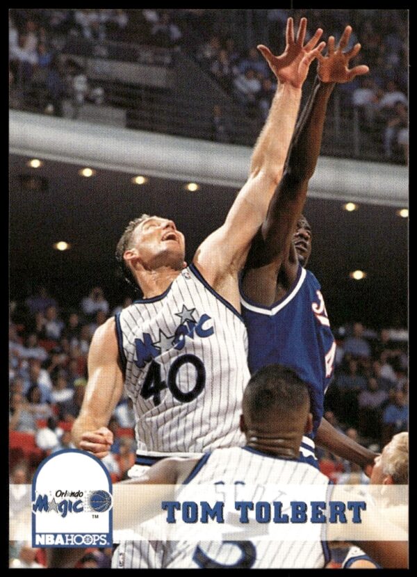 Front view of Tom Tolberts 1993-94 Hoops Basketball Card #159 in action.