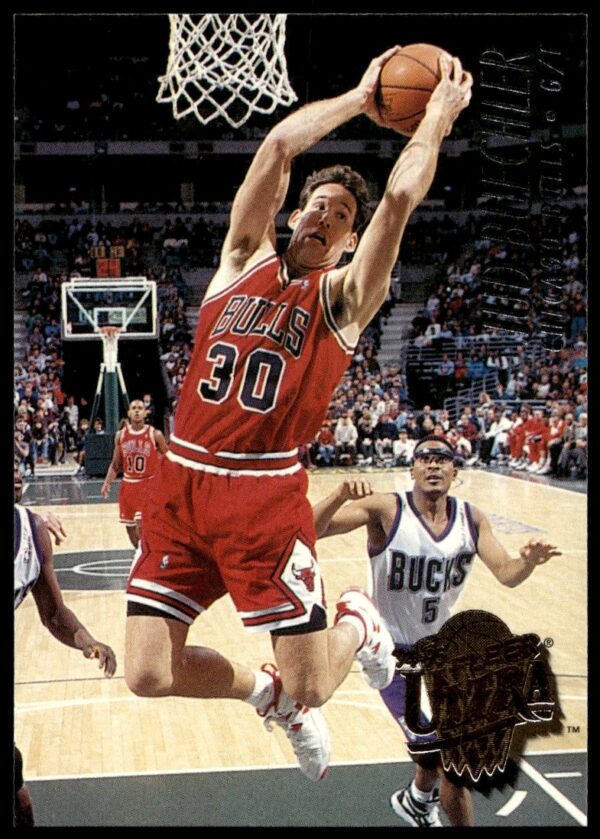 Jud Buechler on 1994-95 Fleer Ultra Basketball Card #217, showcasing athletic action.