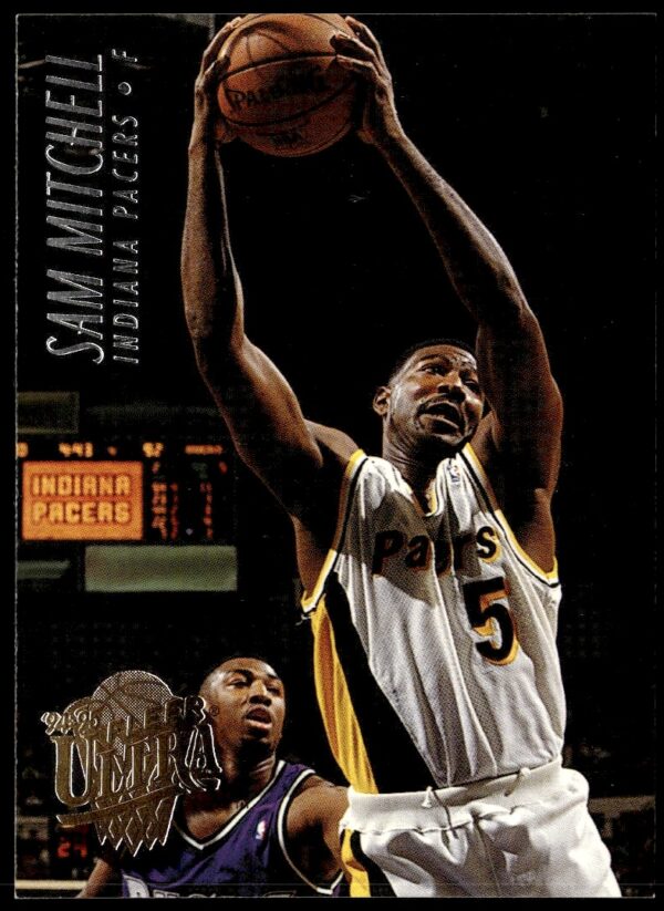 Sam Mitchell 1994-95 Fleer Ultra basketball card, action shot in team uniform.