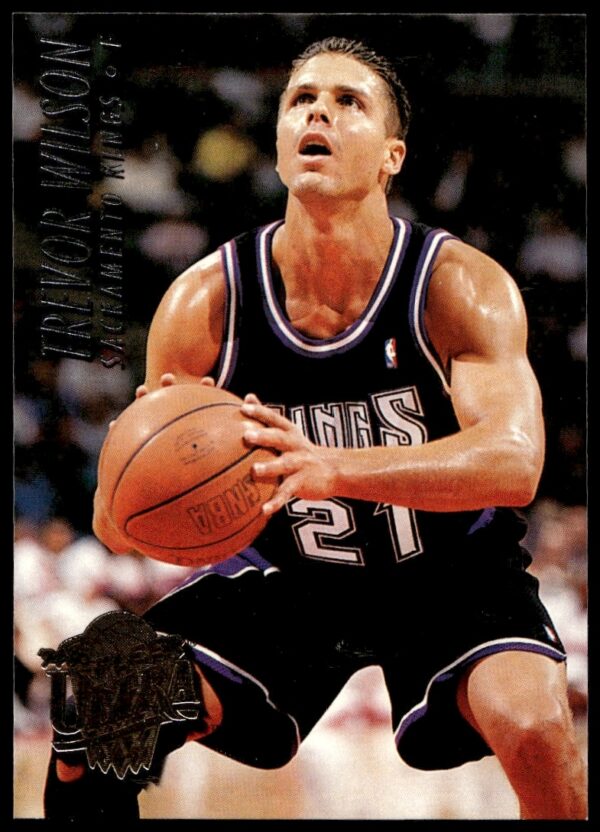1994-95 Fleer Ultra Trevor Wilson Card #329, showcasing dynamic basketball action shot and design.