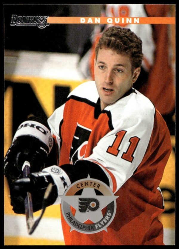 1996-97 Donruss Hockey Card of Dan Quinn, #92, shows him in action on the front.