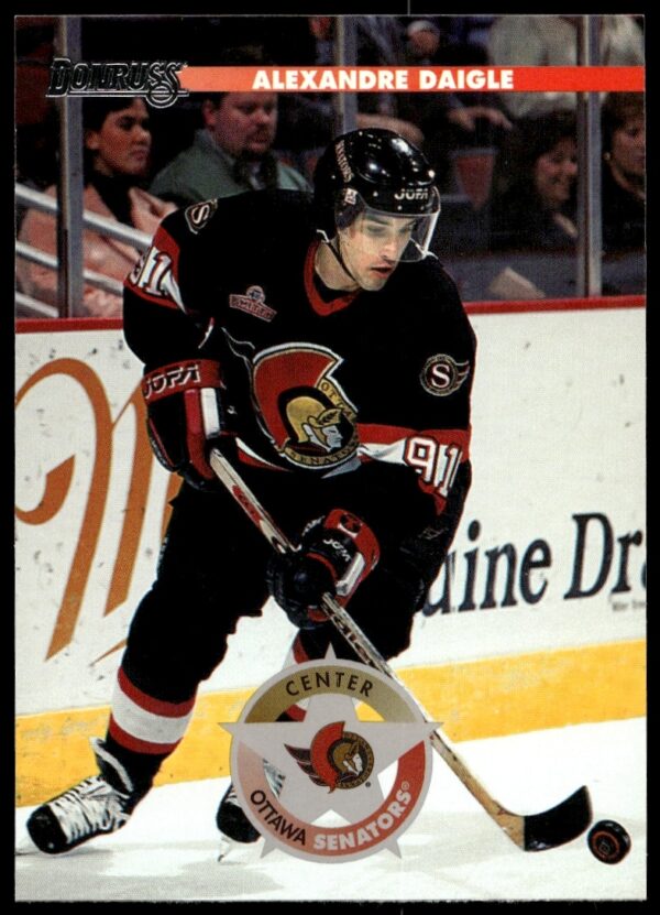 1996 Donruss Hockey Card #204 featuring Alexandre Daigle in team uniform on ice.
