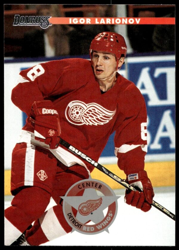 1996 Donruss Igor Larionov hockey card featuring Detroit Red Wings jersey action shot.