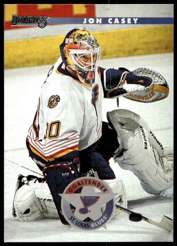 1996 Donruss Jon Casey Hockey Card #37 featuring goalie in action, vintage collectible.