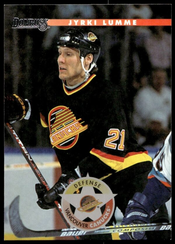 1996 Donruss hockey card featuring Jyrki Lumme in Vancouver Canucks gear on the ice.