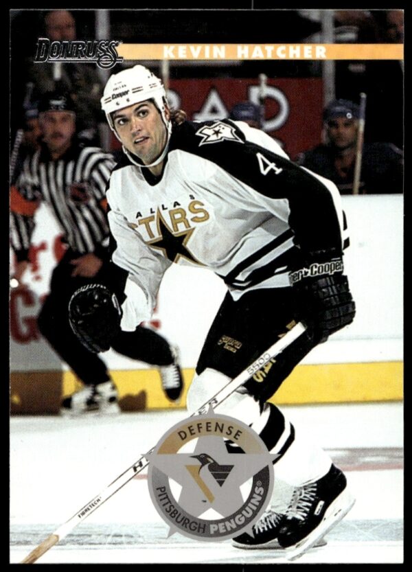 Kevin Hatcher 1996 Donruss Trading Card #29, Washington Capitals, NHL Defenseman Mid-play.