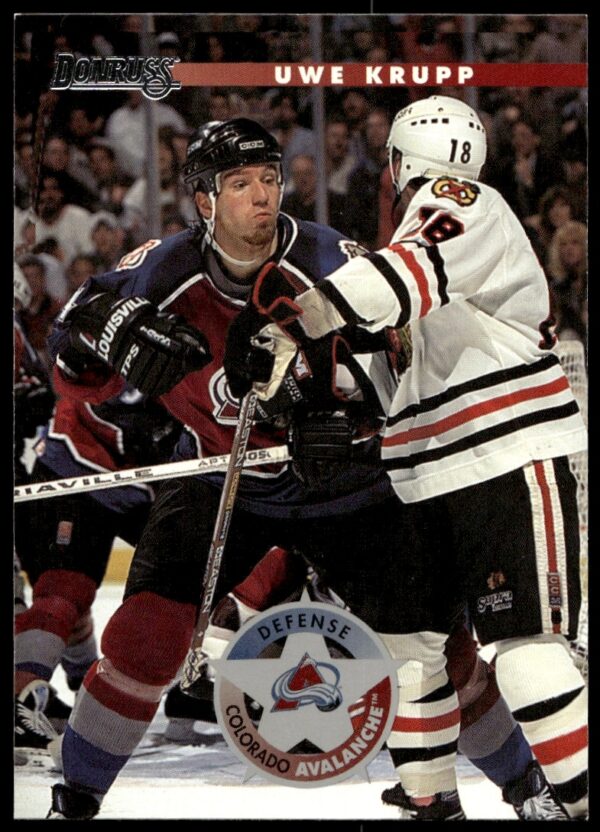 1996 Donruss Uwe Krupp trading card showcasing veteran NHL defenseman in action, card #114.