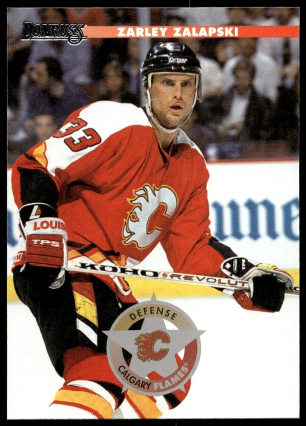 1996 Donruss Hockey Card featuring Zarley Zalapski #4 in action.