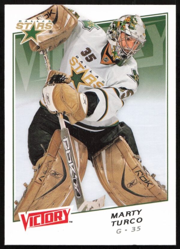 Marty Turco 2008-09 Upper Deck Victory card #133, Dallas Stars goalie in action.
