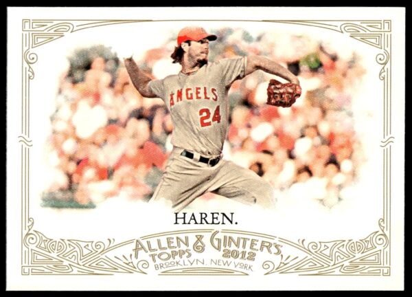 Vintage 2012 Dan Haren baseball card featuring pitcher in warm-up jacket, classic backdrop.