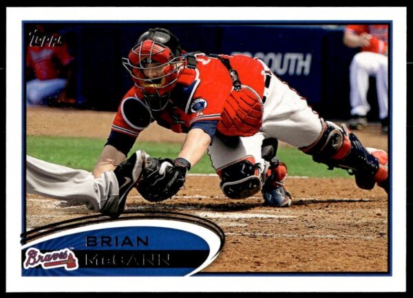 Brian McCann 2012 Topps baseball card #399, showing action as a catcher in uniform.