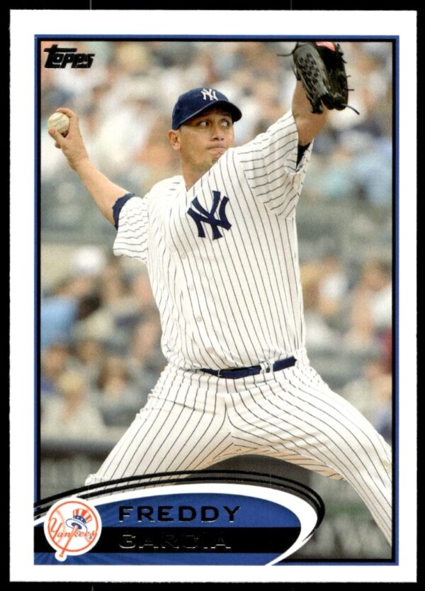 Freddy Garcia 2012 Topps Baseball Card #596, featuring Yankees pitcher in action.