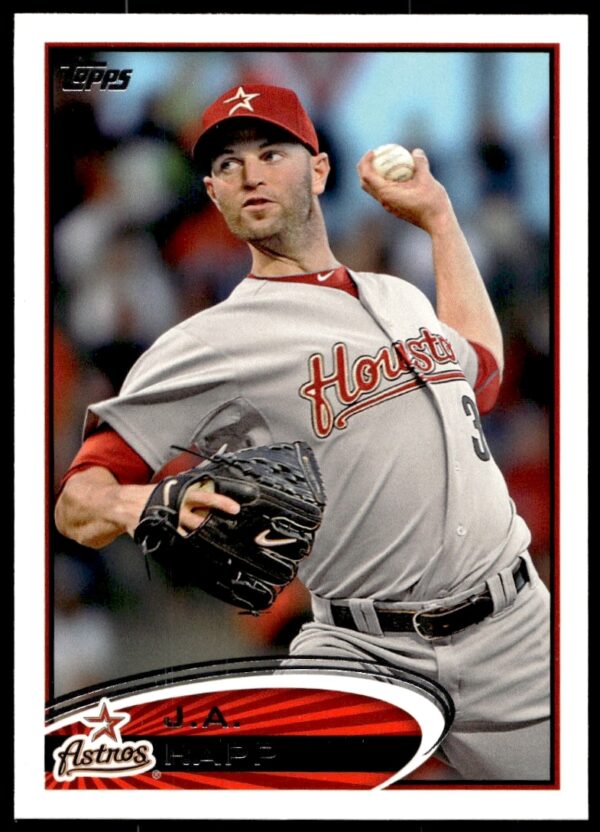 2012 Topps Baseball Card #560: Pitcher J.A. Happ mid-action, focused and determined.