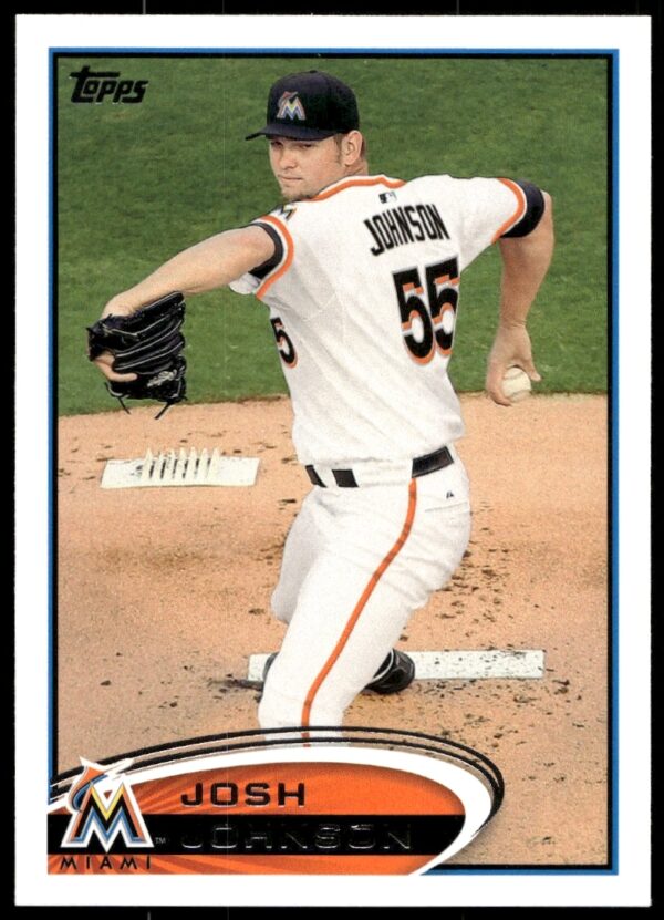 2012 Topps Baseball Card showing Josh Johnson pitching in a Miami Marlins uniform.