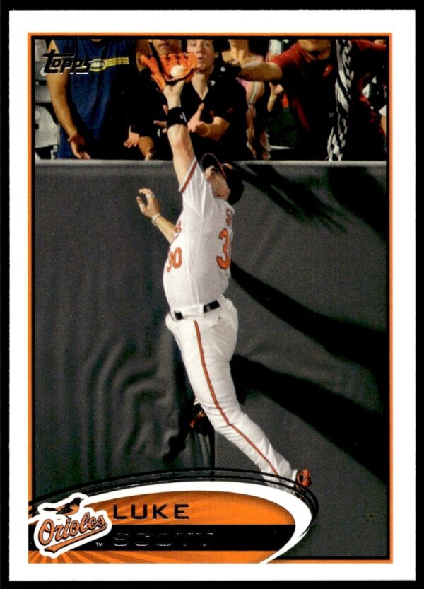 2012 Topps #107 Luke Scott, front portrait in game uniform on baseball field.