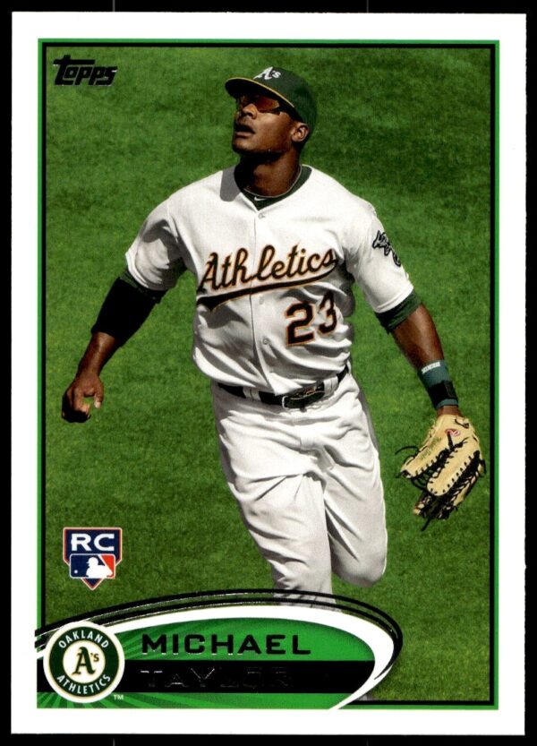 2012 Topps Baseball Card Featuring Michael Taylor, #36, in Action Pose.