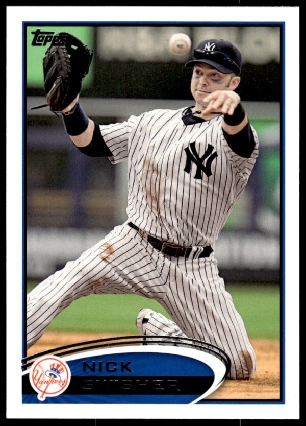 Nick Swisher 2012 Topps card #488 with Yankees backdrop, front view.