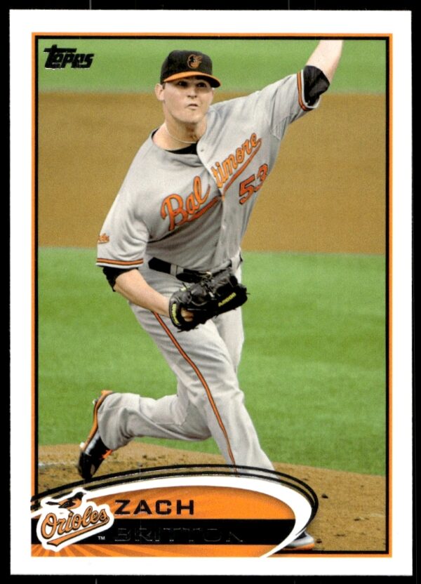Zach Britton 2012 Topps baseball card, Orioles pitcher, dynamic stadium backdrop.