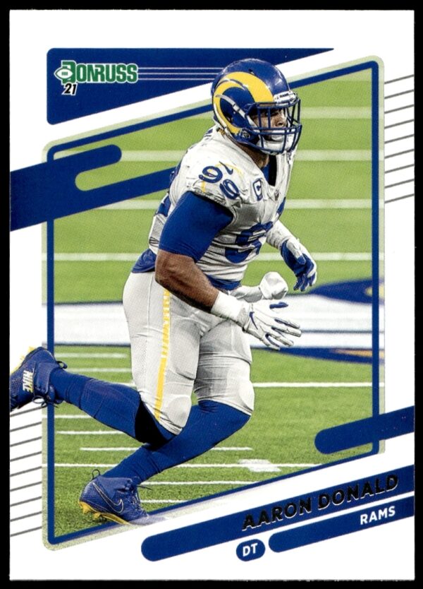 Aaron Donald 2021 Donruss card #140 featuring action shot and team colors.