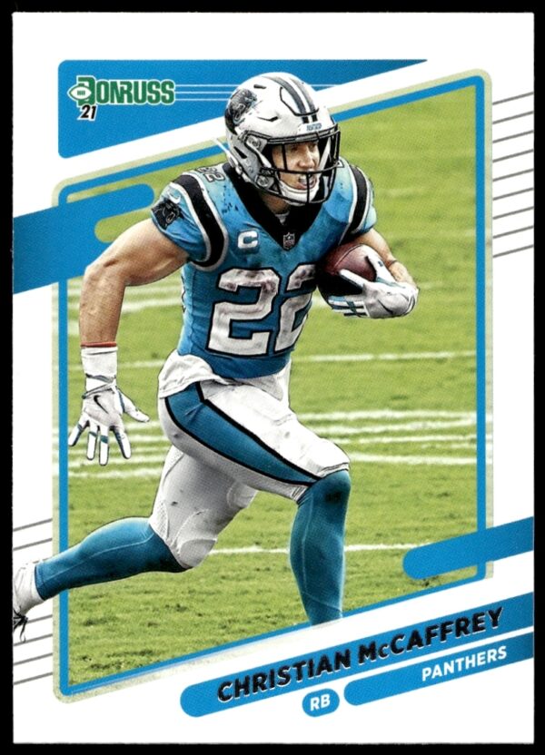 Christian McCaffrey 2021 Donruss Card #219 showcasing dynamic action in Panthers uniform.