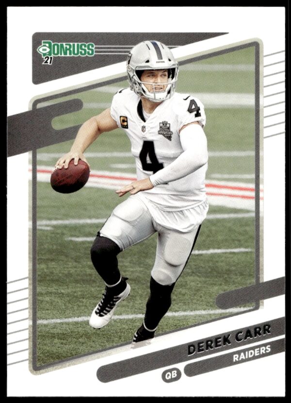2021 Donruss card of Derek Carr, Las Vegas Raiders QB, showcasing dynamic game pose.