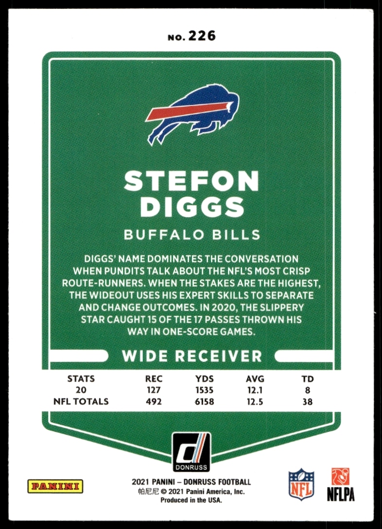 Back of 2021 Donruss Stefon Diggs football card #226 showcasing stats and player bio.