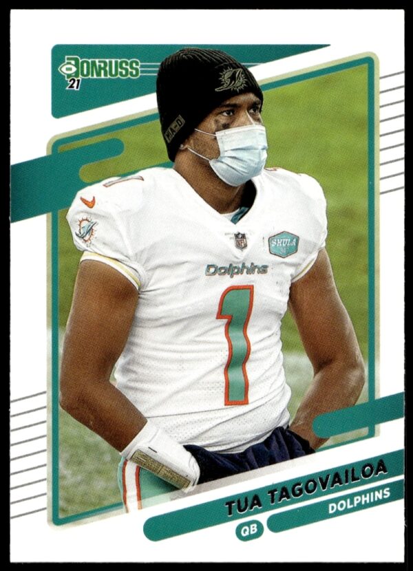 2021 Donruss Tua Tagovailoa football card #61, featuring him without a helmet.