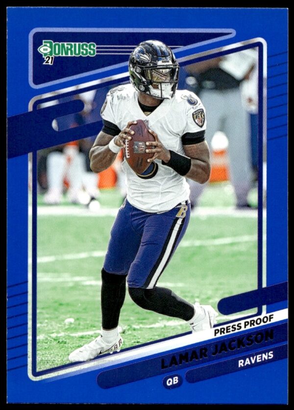 Lamar Jackson 2021 Panini Donruss Blue Card #239 showing action shot in Ravens uniform.