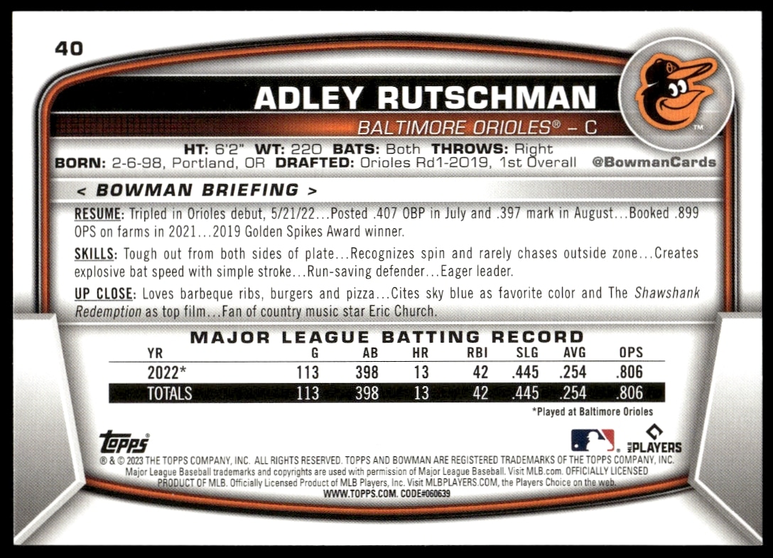 Back of 2023 Bowman Adley Rutschman card features stats and achievements for Orioles catcher.
