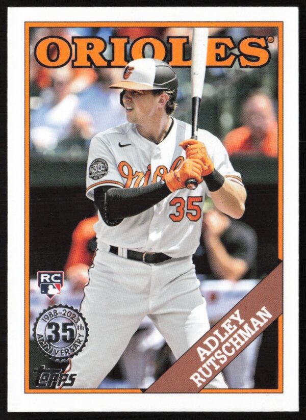 2023 Topps Adley Rutschman 1988 Anniversary Card: Nostalgic Design Honoring His Baseball Impact.