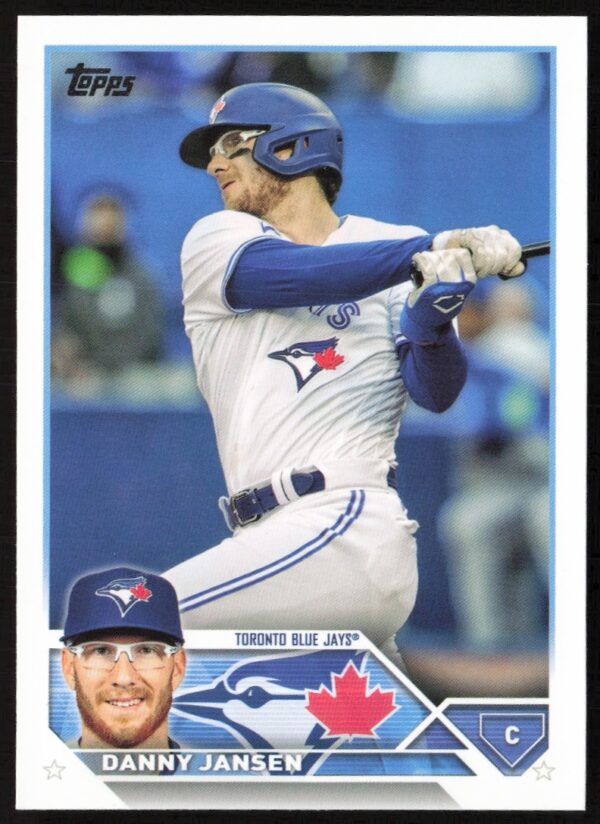 2023 Topps Series 1 Danny Jansen #307 baseball card, Toronto Blue Jays catcher action shot.