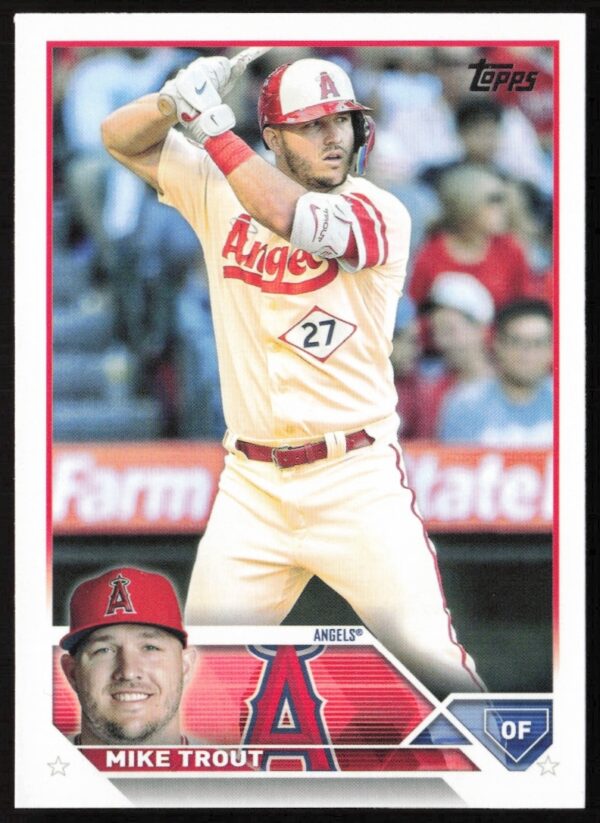 2023 Topps Mike Trout #27 card featuring dynamic mid-swing action shot, Los Angeles Angels colors.