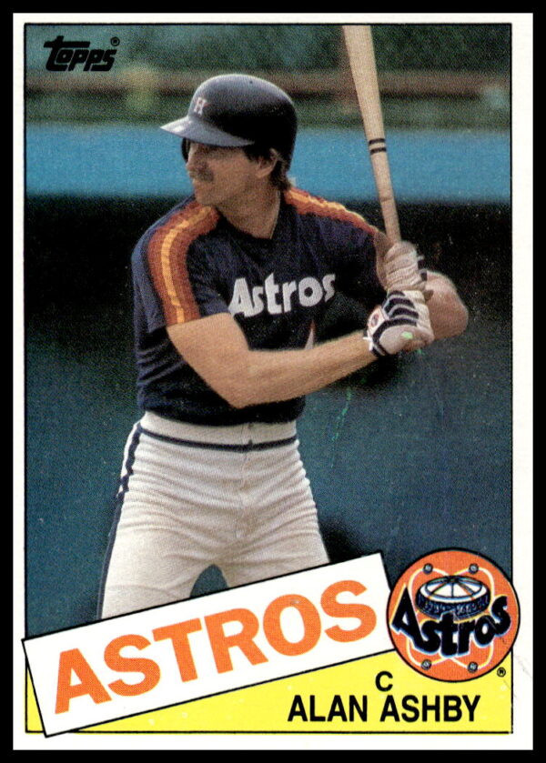 1985 Topps Alan Ashby baseball card showcasing Astros catcher in action.
