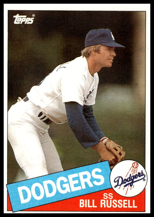 1985 Topps Bill Russell #343, Los Angeles Dodgers, vintage baseball card in batting stance.