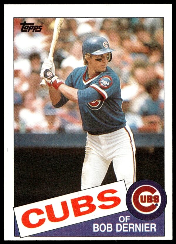 1985 Topps Bob Dernier Baseball Card #589, Cubs Player Mid-Swing in Stadium Background.