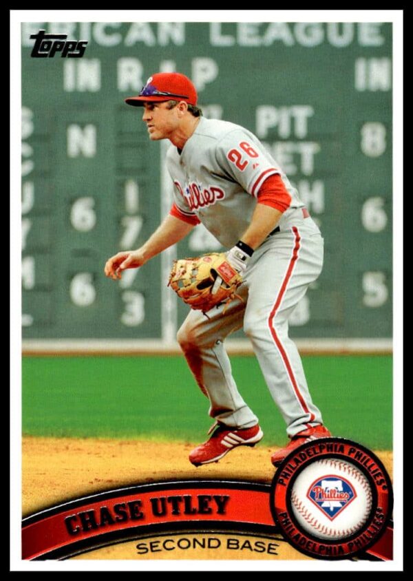 2011 Topps Chase Utley baseball card #214, featuring Phillies star in action, swinging a bat.