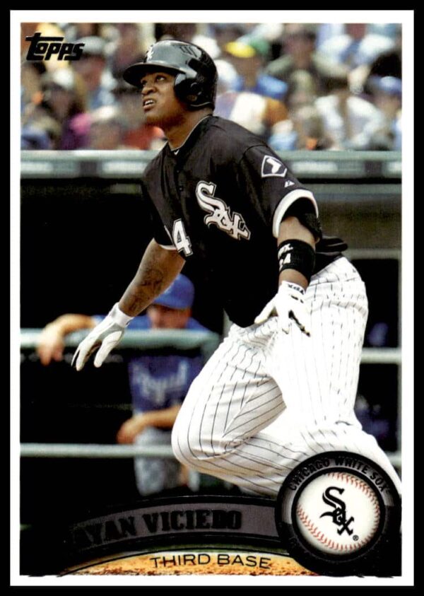 Dayan Viciedo 2011 Topps card #592, Chicago White Sox outfielder, iconic baseball collectible.