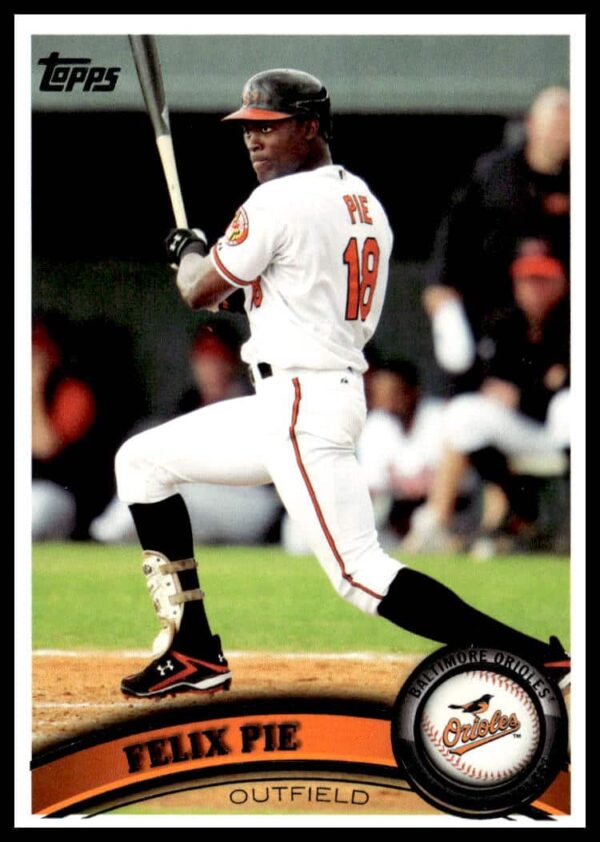 Felix Pie 2011 Topps Baseball Card #106 features the outfielder mid-action, highlighting dynamic gameplay.