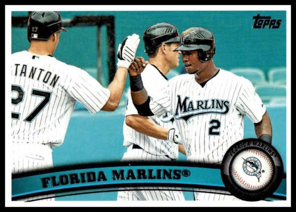 2011 Topps card featuring Florida Marlins player; action shot, card #361, team colors displayed.