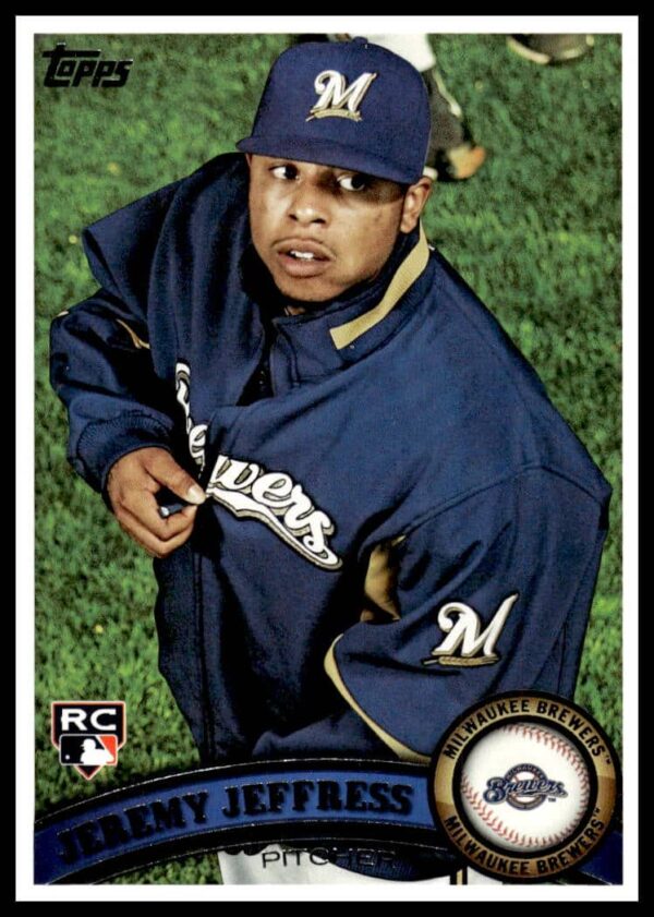Topps 2011 Jeremy Jeffress #143 baseball card, Milwaukee Brewers rookie, pitching action.
