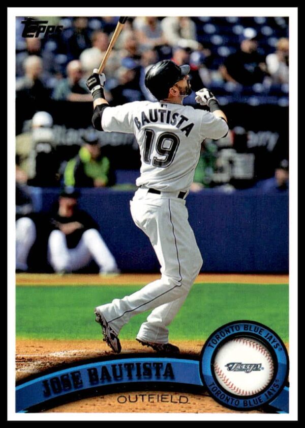 2011 Topps Jose Bautista #216 card front, action shot in Blue Jays uniform.