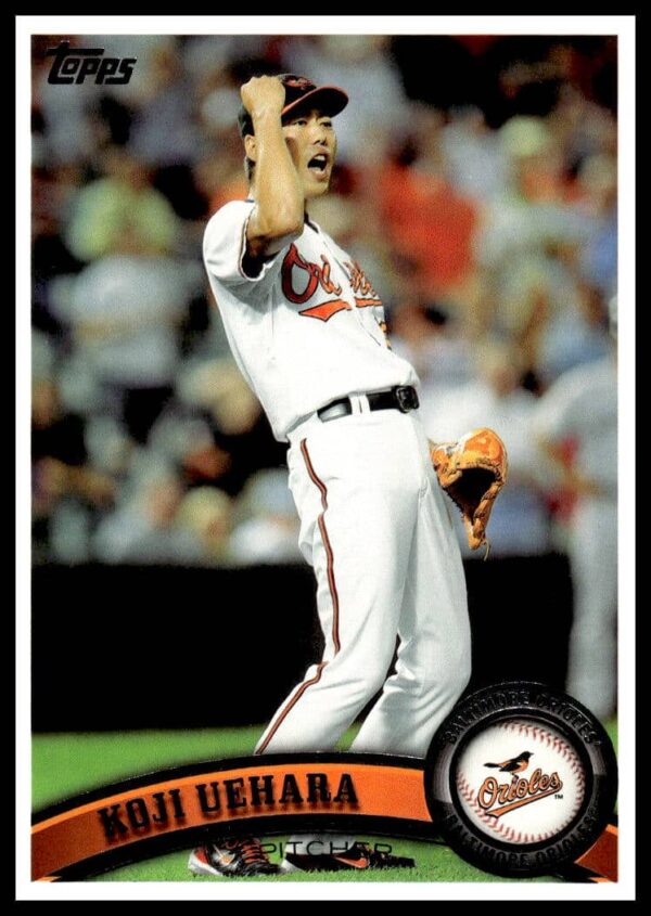 2011 Topps Baseball Card featuring Koji Uehara in Orioles uniform, pitching motion.