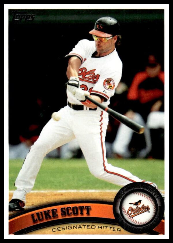 Luke Scott 2011 Topps card #294, depicted in action, orange and black uniform.