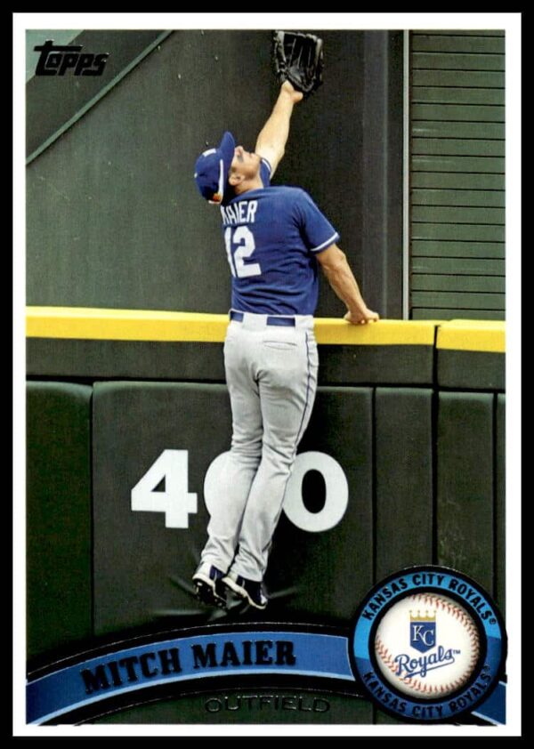 2011 Topps baseball card of Mitch Maier, player #658, in action on the field.