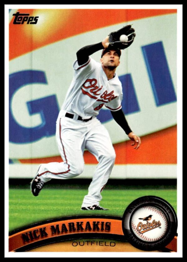 Nick Markakis 2011 Topps Baseball Card #195 front, featuring Orioles outfielder in action.
