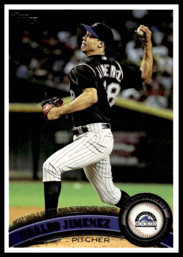 2011 Topps Ubaldo Jimenez baseball card, Colorado Rockies pitcher in action #141.