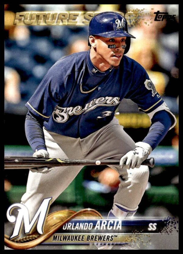 Front view of 2018 Orlando Arcia Topps baseball card, Milwaukee Brewers player in action.
