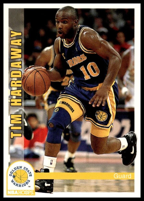 Tim Hardaway dribbling in 1992-93 Warriors uniform, Hoops Series 1 card #74.