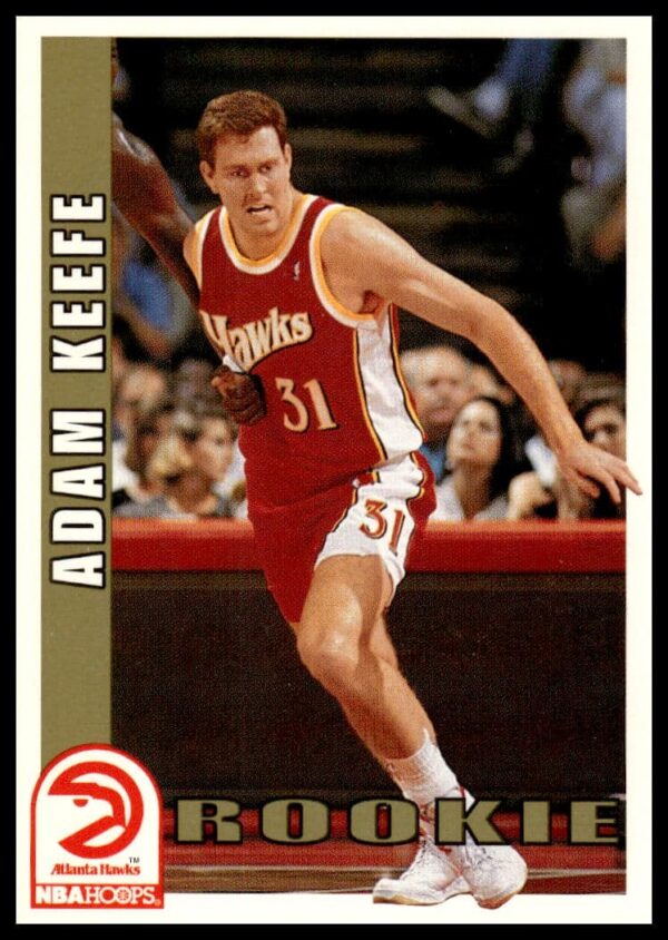 Adam Keefe 1992-93 Hoops card #352 showcasing action and team colors.
